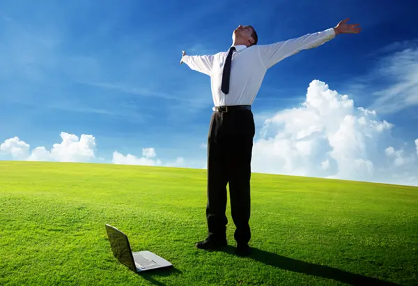 Happy Businessman No Longer Worrying About IT Issues